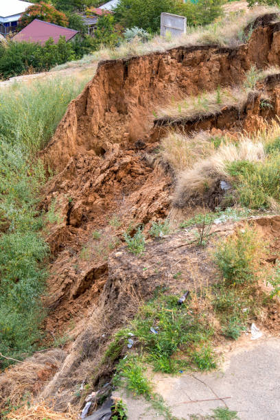 istock Soil landslide on slopes after earthquake. 842350378