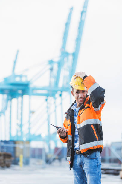istock Hispanic man working at shipping port 842363552