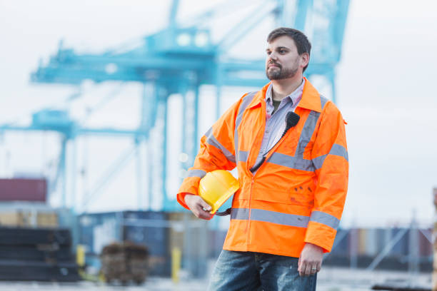 istock Man working at shipping port 842363564
