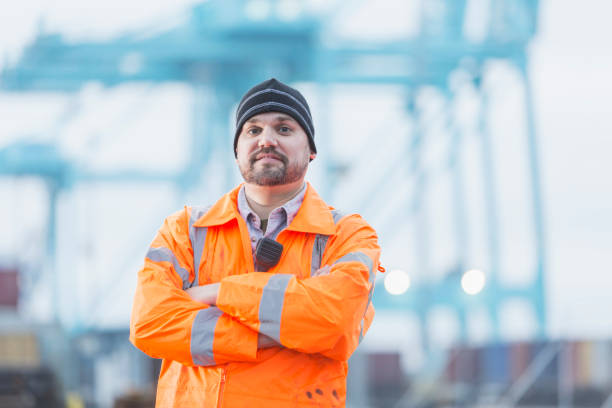 istock Man working at shipping port 842363570