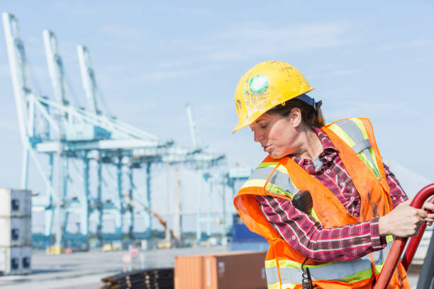 istock Woman working at shipping port 842366432