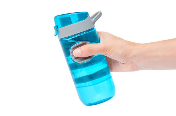 istock Hand holding sport bottle isolated on white background 842369554
