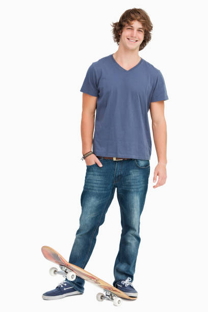 istock Smiling male student with a skateboard 842373088