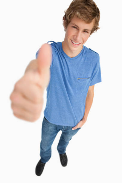 istock Fisheye view of a male student the thumbup 842373698