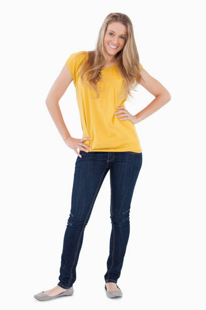 istock Young woman posing with a yellow shirt 842373782
