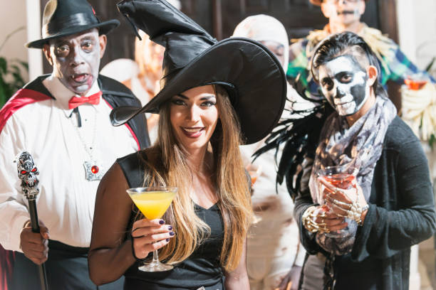 istock Adult halloween party, witch drinking 842376436