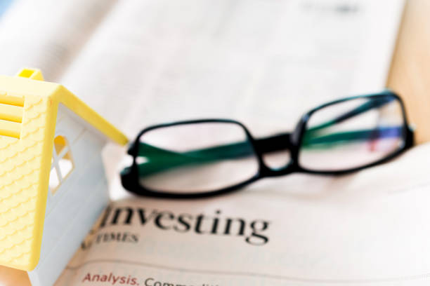 istock Coins on financial newspapers 842379800