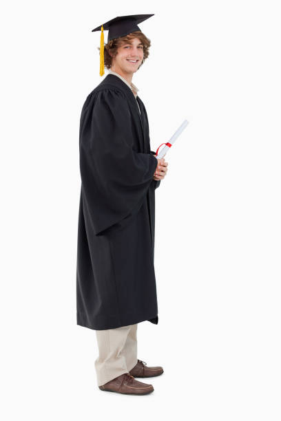 istock Profile view of a student in graduate robe 842382738