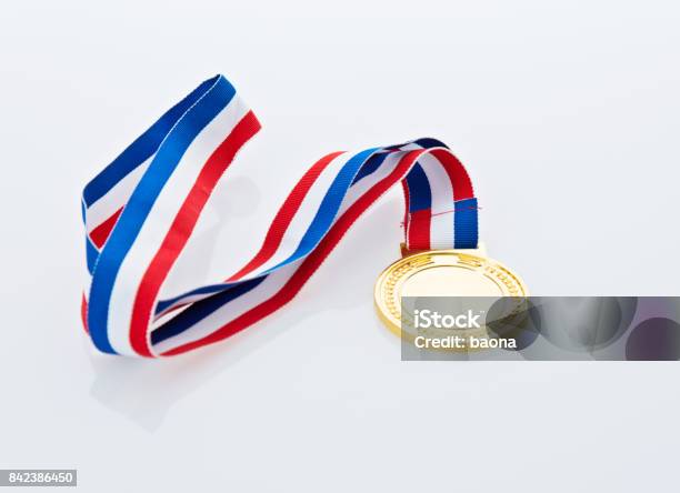 Single Gold Medal Isolated On White Background Stock Photo - Download Image Now - Gold Medal, International Multi-Sport Event, Medal