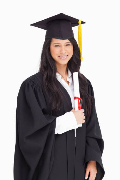 istock A smiling woman holding her degree as she has graduated from university 842390156