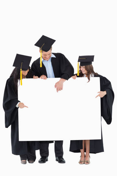 istock Three graduates pointing to the blank sign 842390192