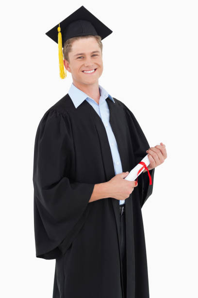 istock A smiling man looking at the camera as he graduates 842390212