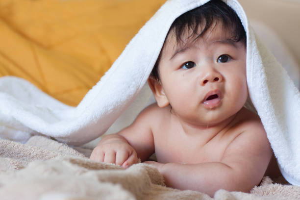 istock A child and a towel after a shower is finished 842393830
