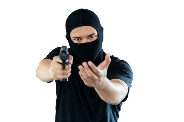 istock terrorist with a gun preparing to fire.isolated white background. with Clipping Path. 842400224