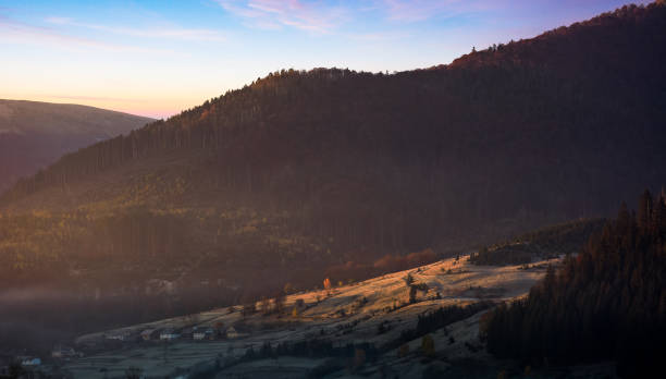 istock warm sunrise in mountainous countryside 842402882