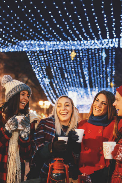 istock Happy under the Christmas lights 842404186