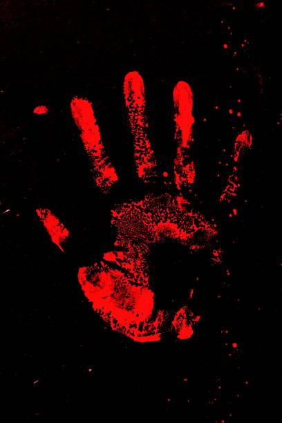 istock Set of red hand prints on black background 842408674