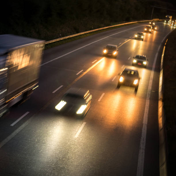 istock Traffic on the german motorway at night 842419436