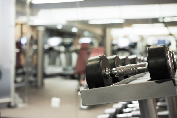 istock Fitness club weight training equipment 842423164