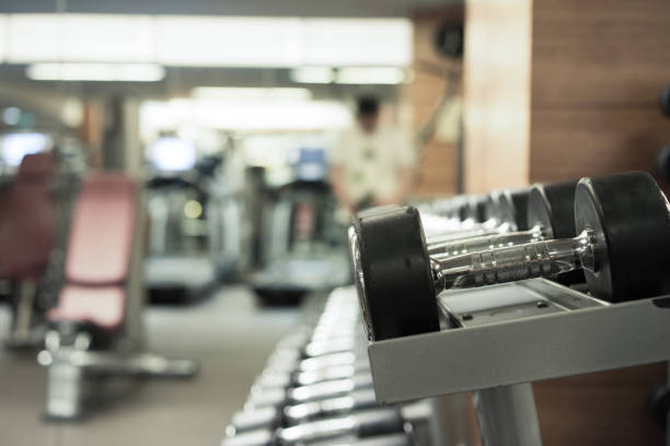 istock Fitness club weight training equipment 842423272