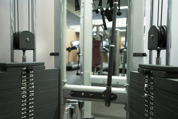 istock Fitness club weight training equipment 842423644