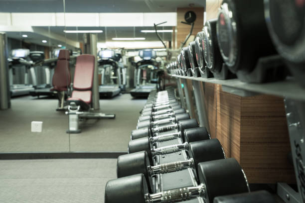 istock Fitness club weight training equipment 842424390