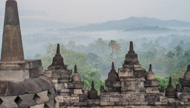 istock Stupa in Borobudur, ancient buddhist temple near Yogyakarta, Java, Indonesia 842424396