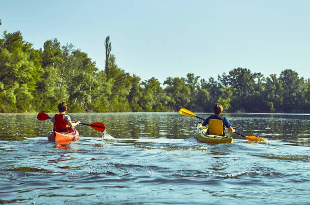 istock A canoe trip along the river along the forest in summer. 842425094