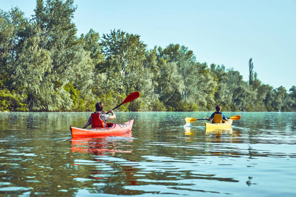istock A canoe trip along the river along the forest in summer. 842425100