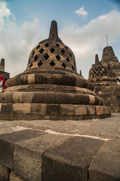 istock Stupa in Borobudur, ancient buddhist temple near Yogyakarta, Java, Indonesia 842425472