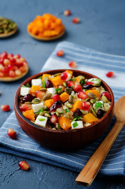 istock Pumpkin pomegranate dried cranberry goat cheese quinoa salad 842426802