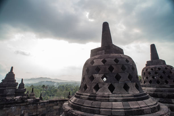 istock Stupa in Borobudur, ancient buddhist temple near Yogyakarta, Java, Indonesia 842427484