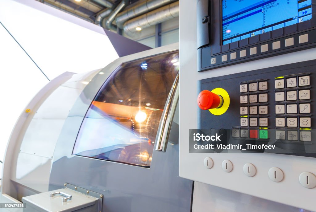 industrial equipment of cnc milling machine center in tool manufacture workshop. industrial equipment of cnc milling machine center in tool manufacture workshop CNC Machine Stock Photo