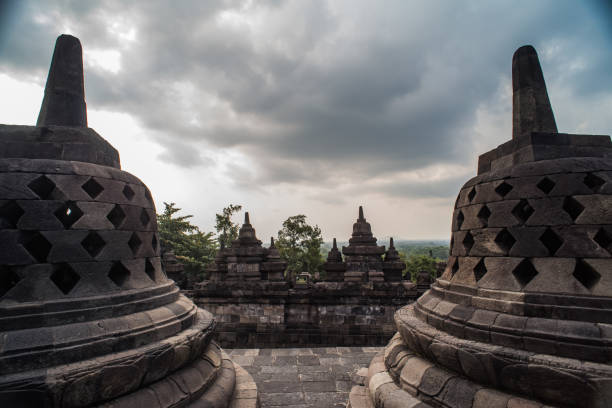 istock Stupa in Borobudur, ancient buddhist temple near Yogyakarta, Java, Indonesia 842428748