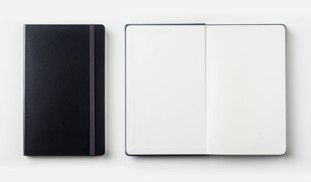 istock Top view collection of black notebook on white background desk 842432542