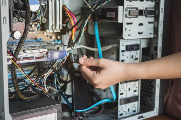 istock Young woman repairing computer 842434620