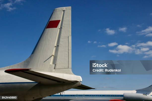 Tail Of An Airplane Airport Stock Photo - Download Image Now - Airplane Tail, Aerodynamic, Aerospace Industry