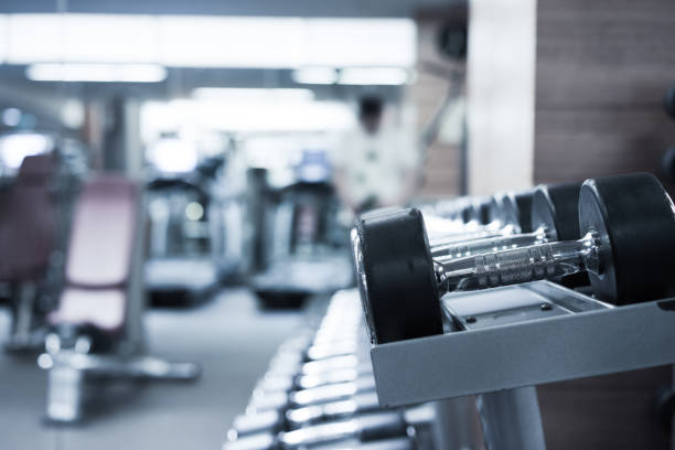 istock Fitness club weight training equipment 842443418