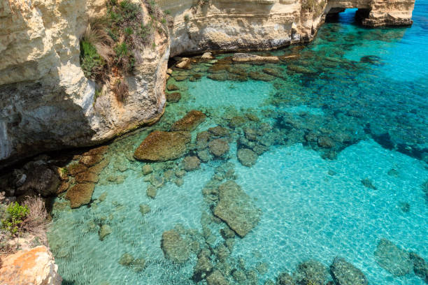 istock Faraglioni at Torre Sant Andrea, Italy 842443606