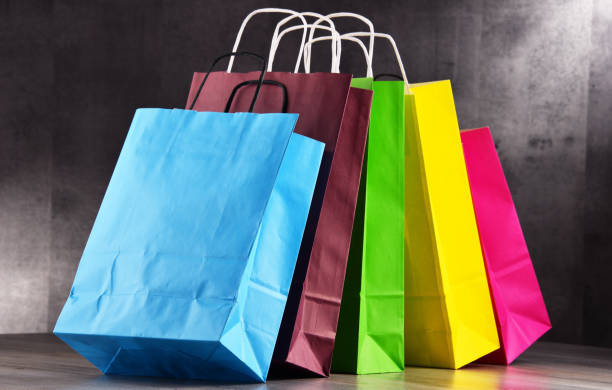 istock Composition with colorful paper shopping bags 842444084