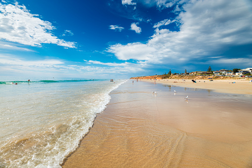 Sunny summer seascape at the beach with white sand, blue water and clear sky! Australia.