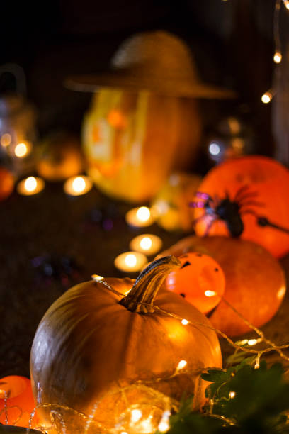 istock Halloween pumpkin head jack lantern on wooden background 842445352