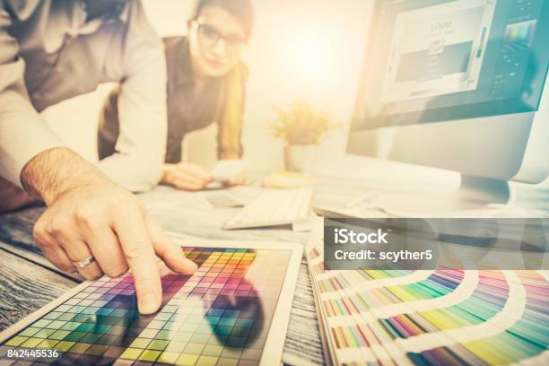 Graphic Designer At Work Color Samples Stock Photo - Download Image Now - Graphic Designer, Real Estate Office, Design Professional