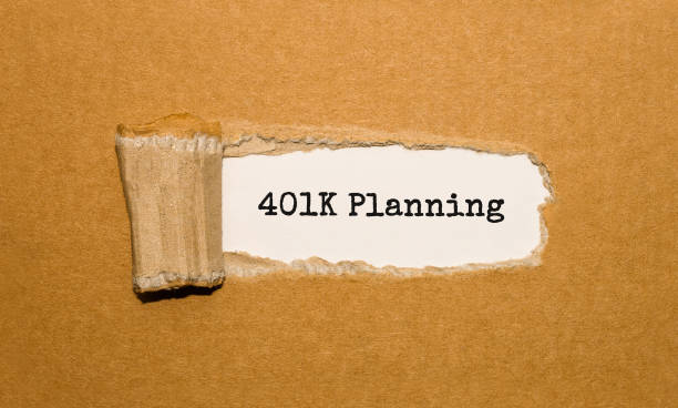 istock The text 401K Planning appearing behind torn brown paper 842445986