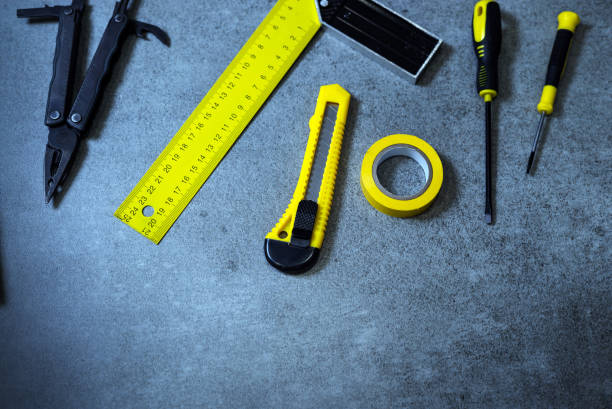 istock Building and project yellow tools concept. Stone desk. Top view, 842446332