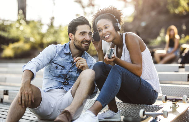 istock Two Friends Hanging out, Listening to Walkman 842447294
