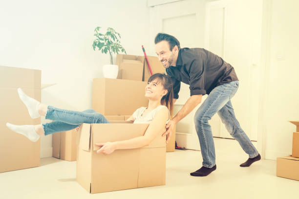 istock Young people move into a new apartment. 842448214