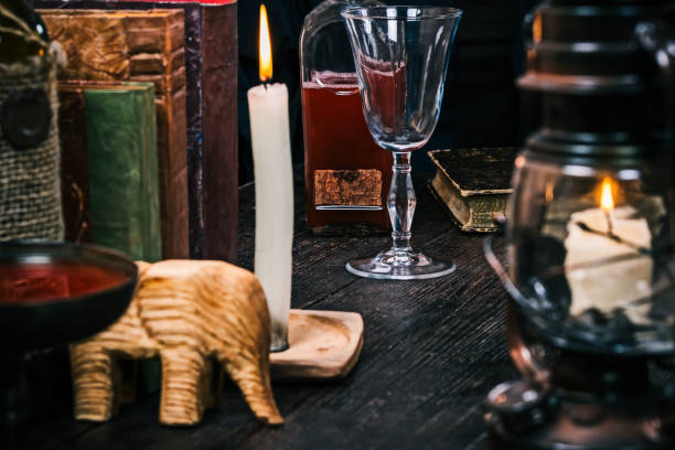 istock Wineglass and potion in private library 842450572