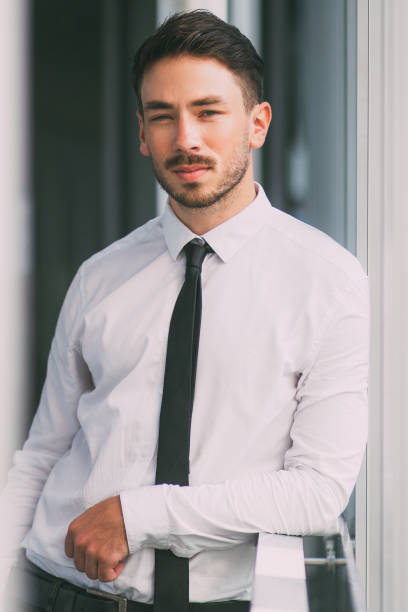 istock Serious young man resting in corridor 842452478