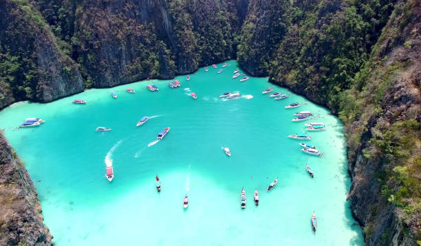 Pileh Lagoon, Ko Phi Phi Leh, Thailand Aerial View of the famous Pileh Lagoon. The small and beautiful Bay is located within the Island Ko Phi Phi Leh just south of the main Island Ko Phi Phi Don. phuket province stock pictures, royalty-free photos & images